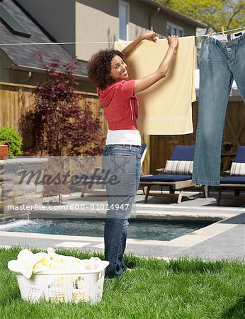 Woman Hanging Laundry