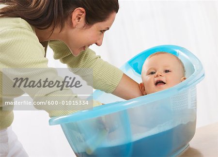 Baby Getting A Bath