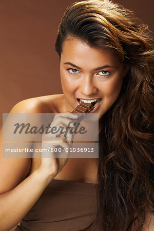 Woman Eating Chocolate Woman Eating Chocolate