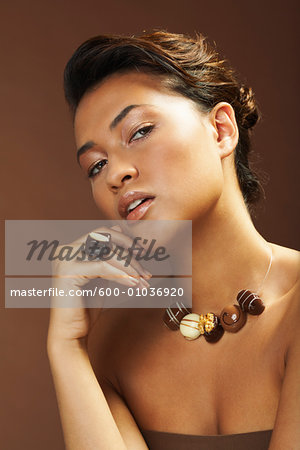 Portrait of Woman With Chocolate Jewelry