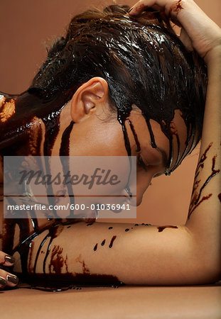 Woman Covered in Chocolate Sauce