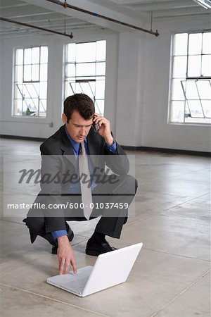 Businessman using Laptop Computer