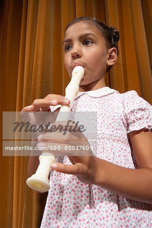 Girl on Stage, Playing Recorder