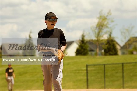 Baseball player walking in a baseball field