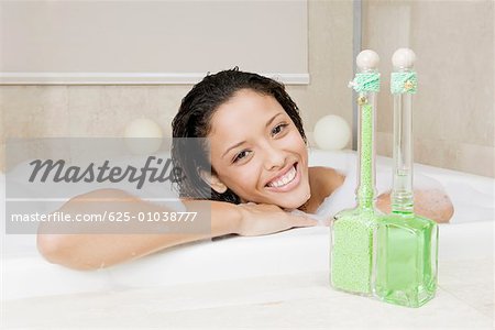 Portrait of a teenage girl having a bath