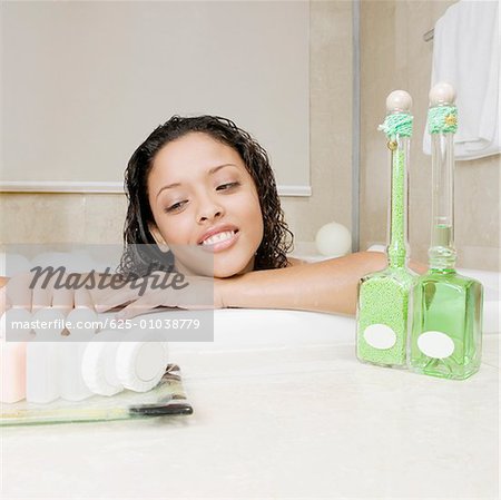 Close-up of a teenage girl having bath