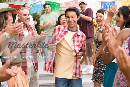 Boy Dancing at Family Gathering