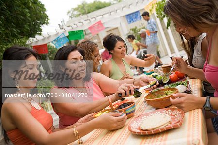 Women Preparing Food at Family Gathering