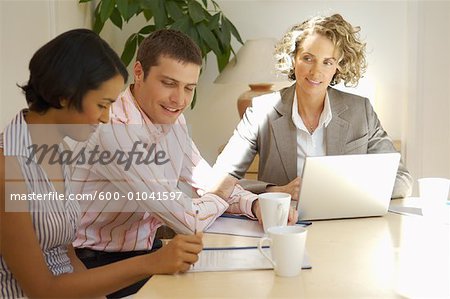 Couple Meeting With Financial Advisor