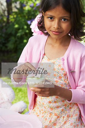 Girl Holding Cupcake