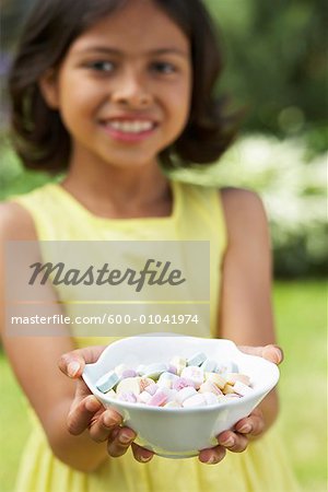 Girl Holding Dish of Candy
