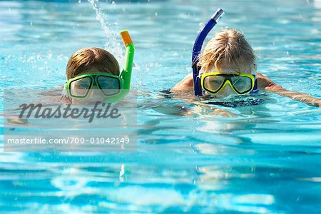 Grandmother and Granddaughter in Swimming Pool