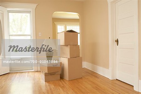 Boxes in Empty Room