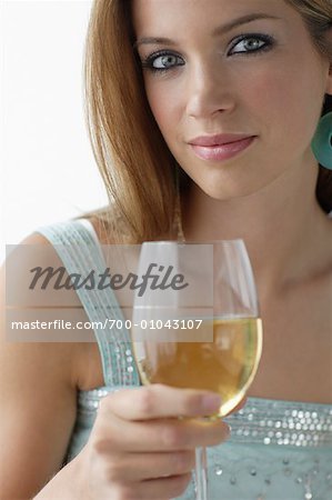 Portrait of Woman Holding Glass of White Wine