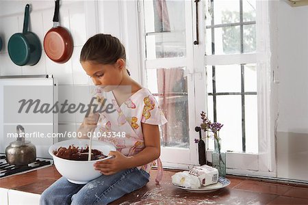 Girl with Mixing Bowl of Chocolate