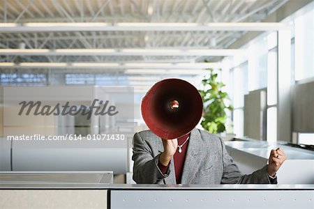 Businesswoman with megaphone