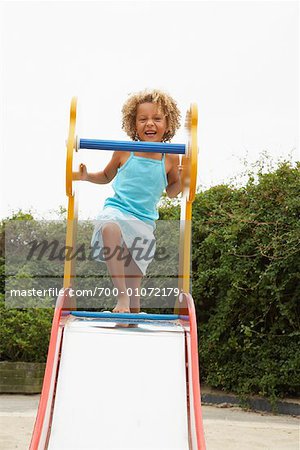 Girl Standing on Slide