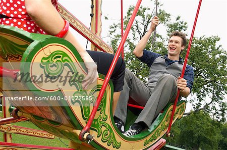 Paar, Reiten, Swingboats, Dampf Carters Fair, England