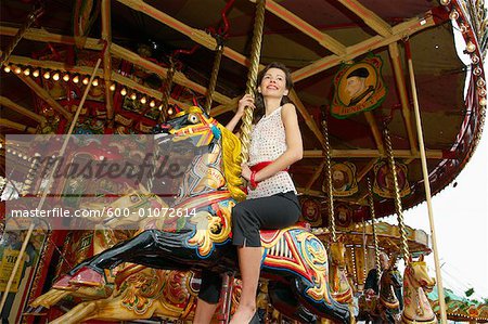 Frau auf Karussell, Dampf Carters Fair, England
