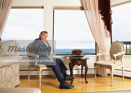 Portrait of Man in Elegant Home