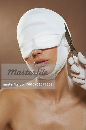 Portrait of Woman with Bandages On Head