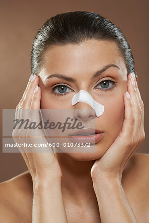 Portrait of Woman with Bandage on Nose