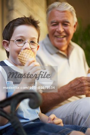 Grandfather and Grandson Eating Ice Cream Cones