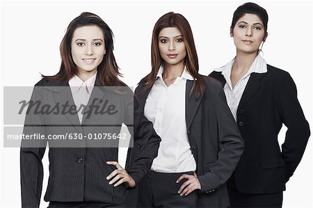 Portrait of three businesswomen standing in a row