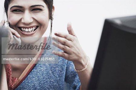 Close-up of a businesswoman talking on a mobile phone