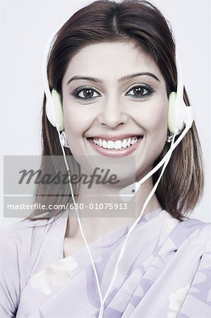 Portrait of a young woman wearing a headset