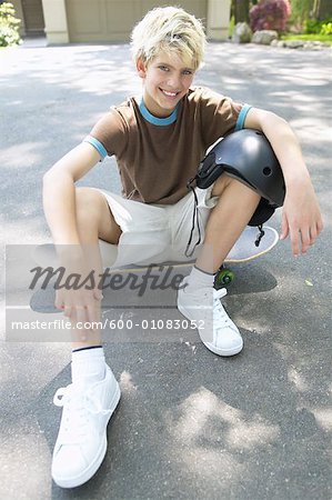 Portrait of Boy with Skateboard