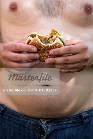 Man Holding Hamburger