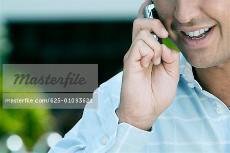 Close-up of a businessman talking on a mobile phone