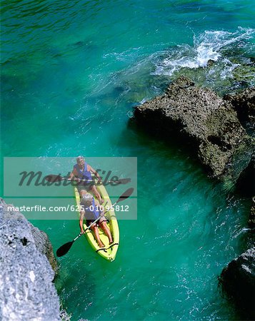 High angle view of two people rafting in the sea, Bermuda