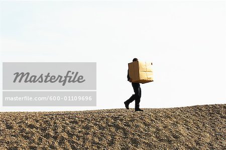 Man Carrying a Box