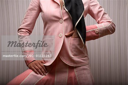 Torso of Woman in Jacket and Skirt