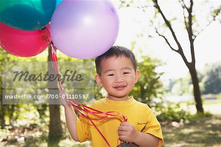 Portrait of Boy with Balloons