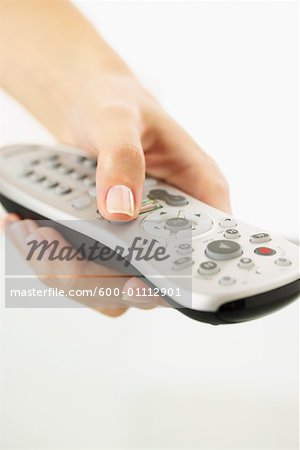 Hand Holding Remote Control