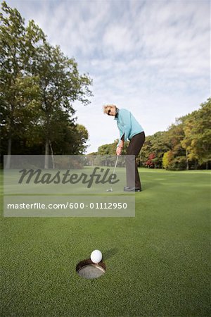 Woman Golfing