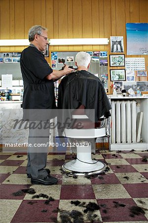 Barber Cutting Customer's Hair