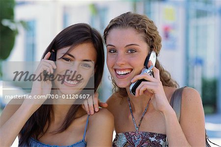 Portrait of Women Using Cellular Phones