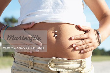 teenage belly button piercing