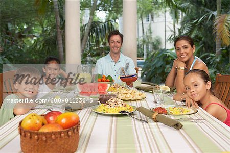 Portrait of Family at Dinner Table