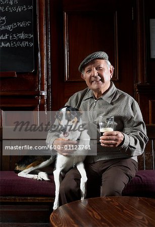 Man With Dog in Pub