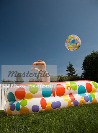 Little Boy Playing in Pool