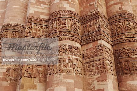 Close-up of the stone wall of a monument, Qutub Minar, New Delhi, India