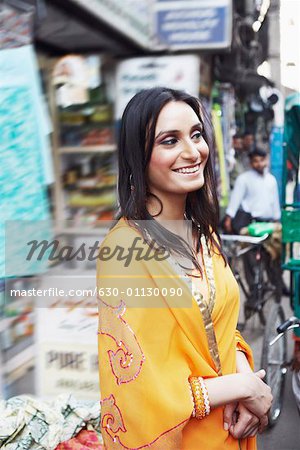 Side profile of a young woman smiling