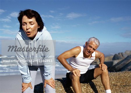 Mature couple in sportswear, resting