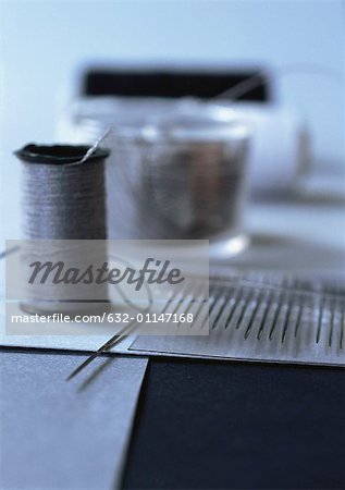 Thread and sewing needles, close-up