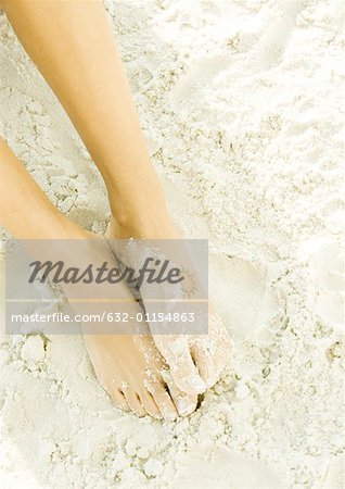 Frau Füße im sand